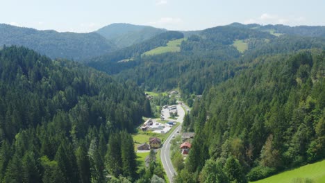 Wide-angle-aerial-above-the-outskirts-and-roads-of-Slovenj-Gradec,-Slovenia