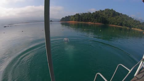 Caucasian-man-swims-in-Khao-Sok-Lake
