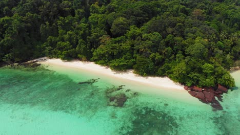 Aerial-dolly-in-shot-of-beautiful-tropical-beach-on-exotic-island-on-Andaman-Sea-in-Thailand---Koh-Kradan