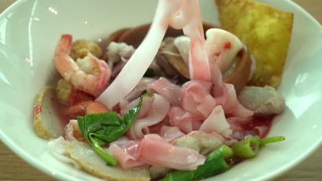 Pink-seafood-flat-noodles