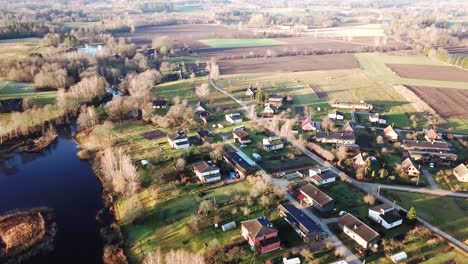 Idyllic-landscape-in-sunny-day.-Aerial,-pan-right