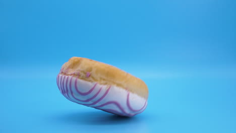 Concepto-De-Obesidad-Donut-Azucarado-Cayendo-A-Cámara-Lenta