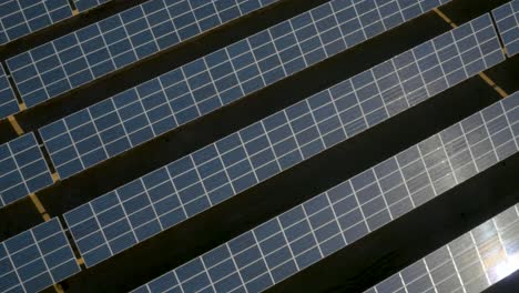 Flying-over-solar-panels.-Aerial-panning