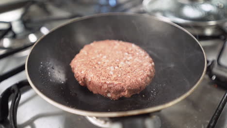 Vegan-plant-based-burger-cooking-on-frying-pan