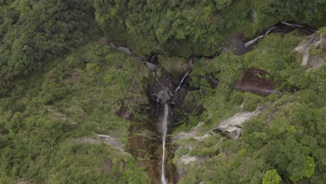 Aerial-birds-eye-high-above-Taiwan-jungle-wilderness-woodland-waterfall-cascading-refreshing-environment