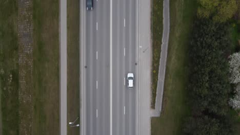 Shot-from-above-of-cars-moving-in-city-traffic