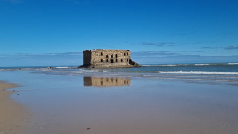 Nice-panoramic-shot-of-the-well-known-house-of-the-sea-in-the-city-of-Tarfaya,-Morocco