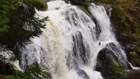 Static-close-up-view-of-Triberg-waterfall-during-fall-season-day,-Schwarzwald-Germany