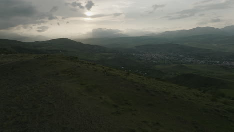 Aerial-View-Of-Rural-Village-Against-Cloudy-Sky-In-Samtskhe-Javakheti,-Near-Akhaltsikhe-In-Georgia---drone-shot