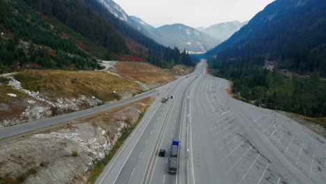 Following-a-Semi-Truck-on-the-Coquihalla-Highway-5-in-British-Columbia-Canada-on-a-sunny-day-in-the-fall
