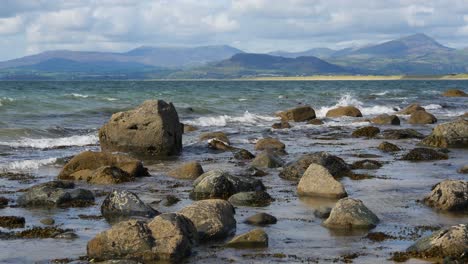 Rocky-coastline-No-1,-looking-towards-the-Llyn-Peninsula-from-near-Morfa-Dyffryn,-Wales,-UK,-Static-Camera,-15-Second-version