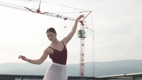 Ballet-girl-calmly-dancing-by-a-construction-site