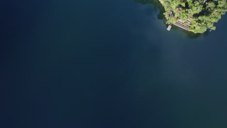 Top-Down-View-Of-Lake-Eacham-In-Atherton-Tableland,-Queensland,-Australia---drone-shot
