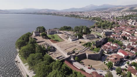 Aerial-view-of-beautiful-old-city-of-Ioannina-in-Greece-with-Lake-Pamvotida-in-sunlight