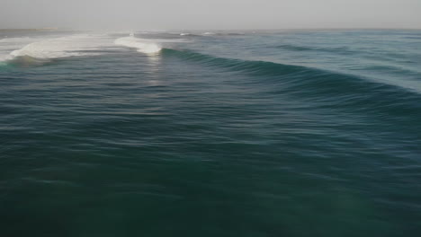 Waves-Rolling-In-Foamy-Surface-Of-A-Seascape-Shoreline