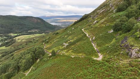4K-drone-shot-approaching-path-leading-to-Ben-Nevis-mountain-above-Glen-Nevis,-Fort-William