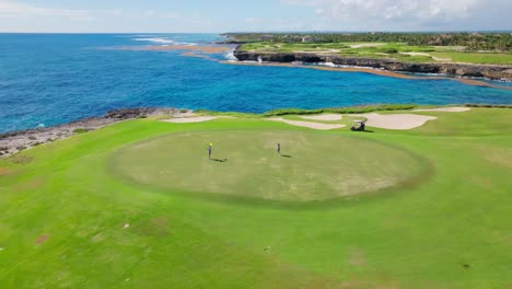 People-playing-golf-at-Corales-Golf-Course,-Punta-Cana-Resort-in-Dominican-Republic