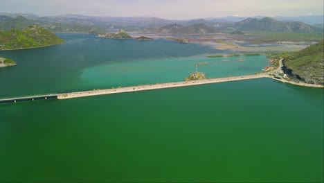 Drone-view-of-Vehicular-highway,-Montenegro.-sea-highway