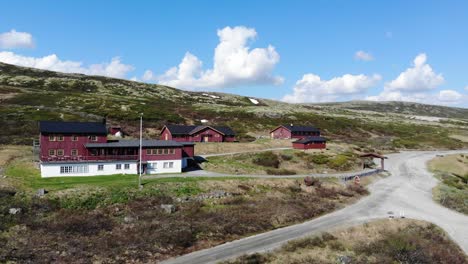 Dronefootage--of-cabin-in-norwegian-mountainlandscape