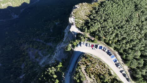 Aerial-view-flying-over-Catalonia-woodland-mountain-scenic-observation-deck-high-on-cliff-edge