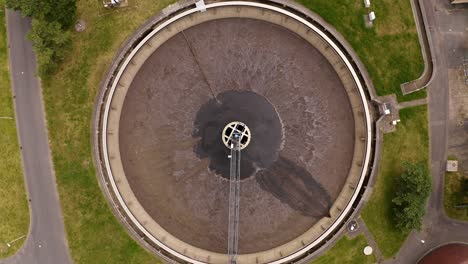 Ascending-Shot-View-Of-Empty-Waster-Water-Tank-At-Treatment-Plant
