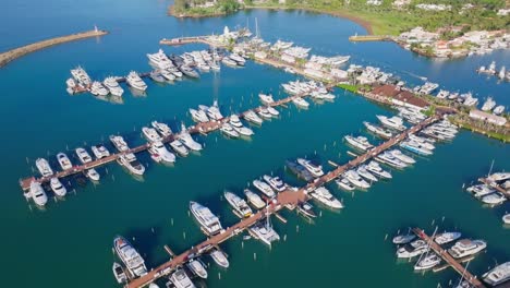 Aerial-top-down-of-luxury-boats-and-yachts-docking-at-jetty-of-MARINA-CASA-DE-CAMPO-in-La-Romana
