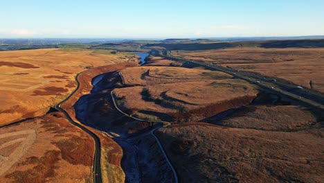 High-Aerial-Moorland-View-of-Saddleworth-moor,-the-M62-motorway-and-Ripponden-road