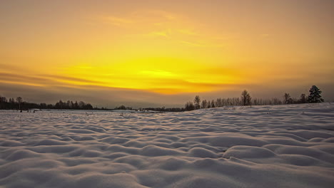 The-warm,-golden-sunrise-burns-the-mist-and-fog-away-in-this-winter-time-lapse
