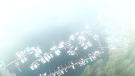 Aerial-riser-shot-of-Deep-Cove-Marina-in-the-Fog-in-North-Vancouver