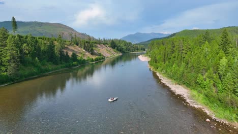 Tourists-On-The-Boats-In-Flathead-River,-Montana,-USA---aerial-drone-shot