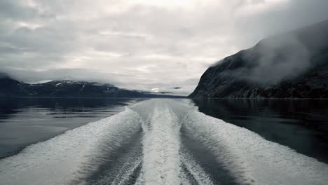 Sailing-trails-in-icy-water,-outside-Nuuk-Greenland