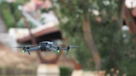 Professional-drone-flying,-background-out-of-focus