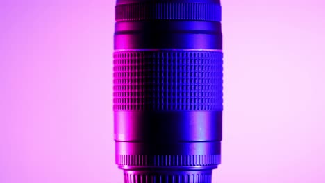 Professional-telephoto-lens,-studio-shot-with-blue-and-purple-light