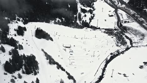 Aerial-of-a-ski-resort-with-very-little-people-during-COVID-19-pandemic