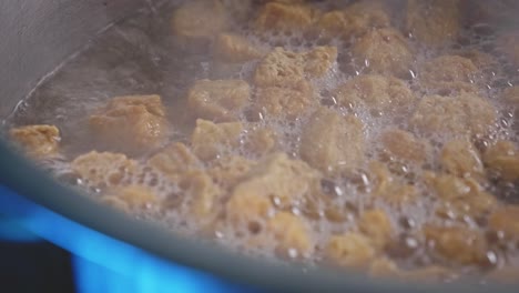 Adding-soy-chunks-into-boiling-water
