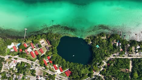 Cenote-Negro-and-the-turquoise-coast-of-the-Bacalar-lagoon,-in-Mexico---cenital,-aerial-view