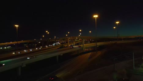Night-time-view-of-rush-hour-traffic-in-San-Antonio,-Texas