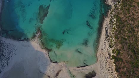 Drone-shot-of-ocean-textures-from-above-in-Balos-Beach---Crete,-Grece