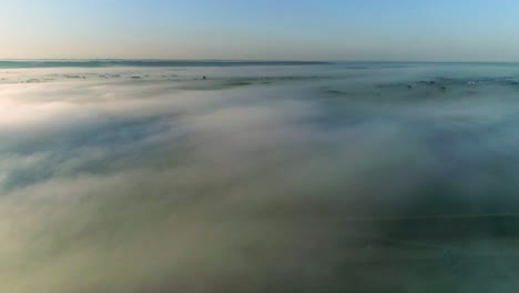 Beautiful-footage-of-a-landscape-above-the-clouds