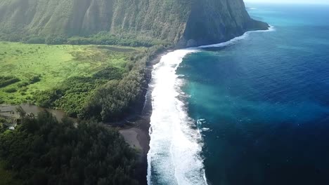 Hawaii---Flying-from-the-Look-Out-towards-the-Ocean-at-Waipio