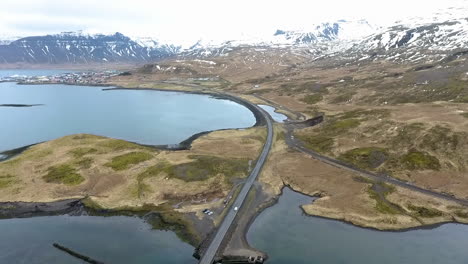 Drone-Shot-Moving-Forward-of-a-Road-Winding-Through-Iceland-Landscape