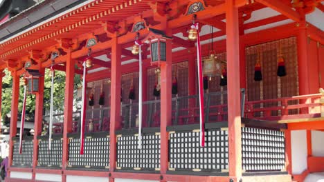 Slide-shot-of-a-beautiful-red-shrine-in-Kyoto,-Japan-4K-slow-motion