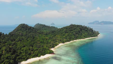 Aerial-shot-of-beautiful-tropical-island-on-Andaman-Sea-in-Thailand---Koh-Kradan
