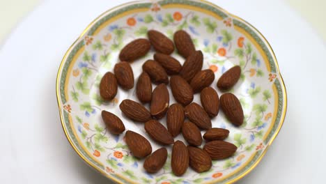 Almonds-spin-on-a-white-background