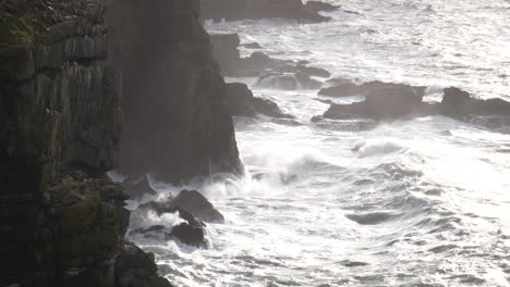 Slow-Motion-Stormy-Sea-Waves-Against-High-Cliffs-Wales