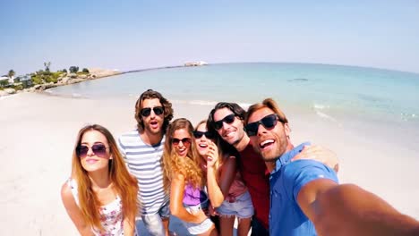 Group-of-friends-having-fun-at-beach
