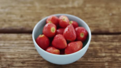 Overhead-of-fresh-strawberries-in-bowl
