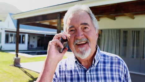 Senior-man-talking-on-phone