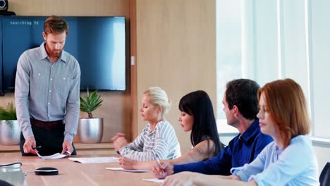 Executive-giving-presentation-in-conference-room-4k