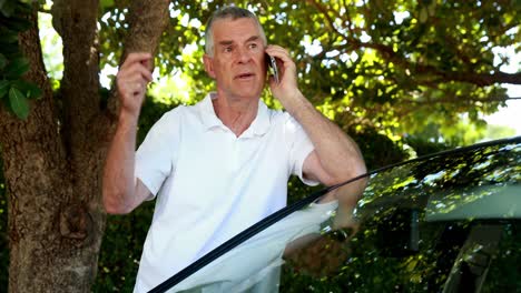 Senior-man-talking-on-mobile-phone-4k